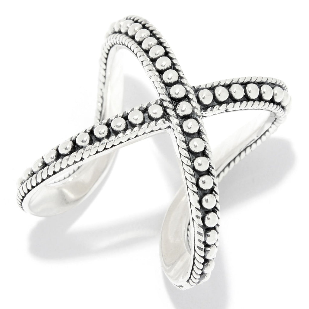 CROSS RING WITH INTRICATE DOT DESIGN