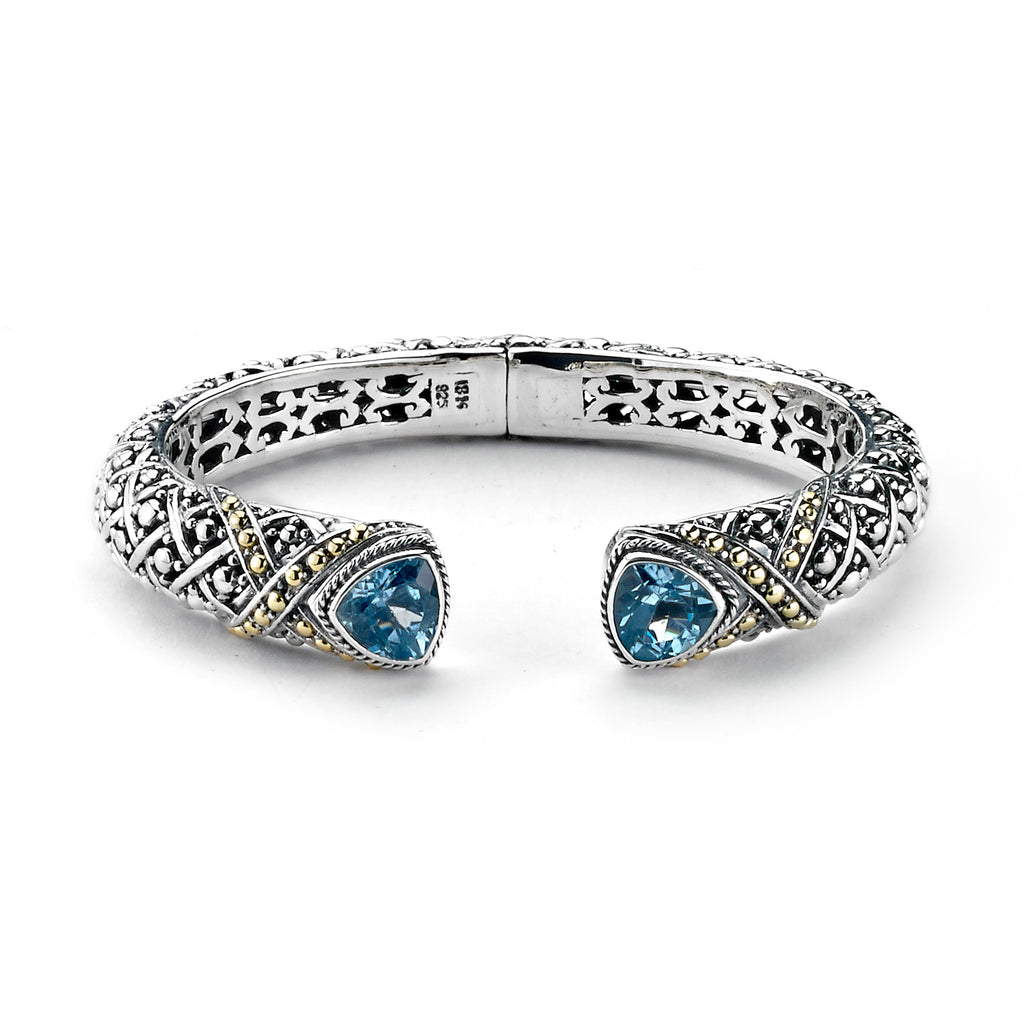 SS/18K HINGED BANGLE WITH TRILLION CUT BLUE TOPAZ
