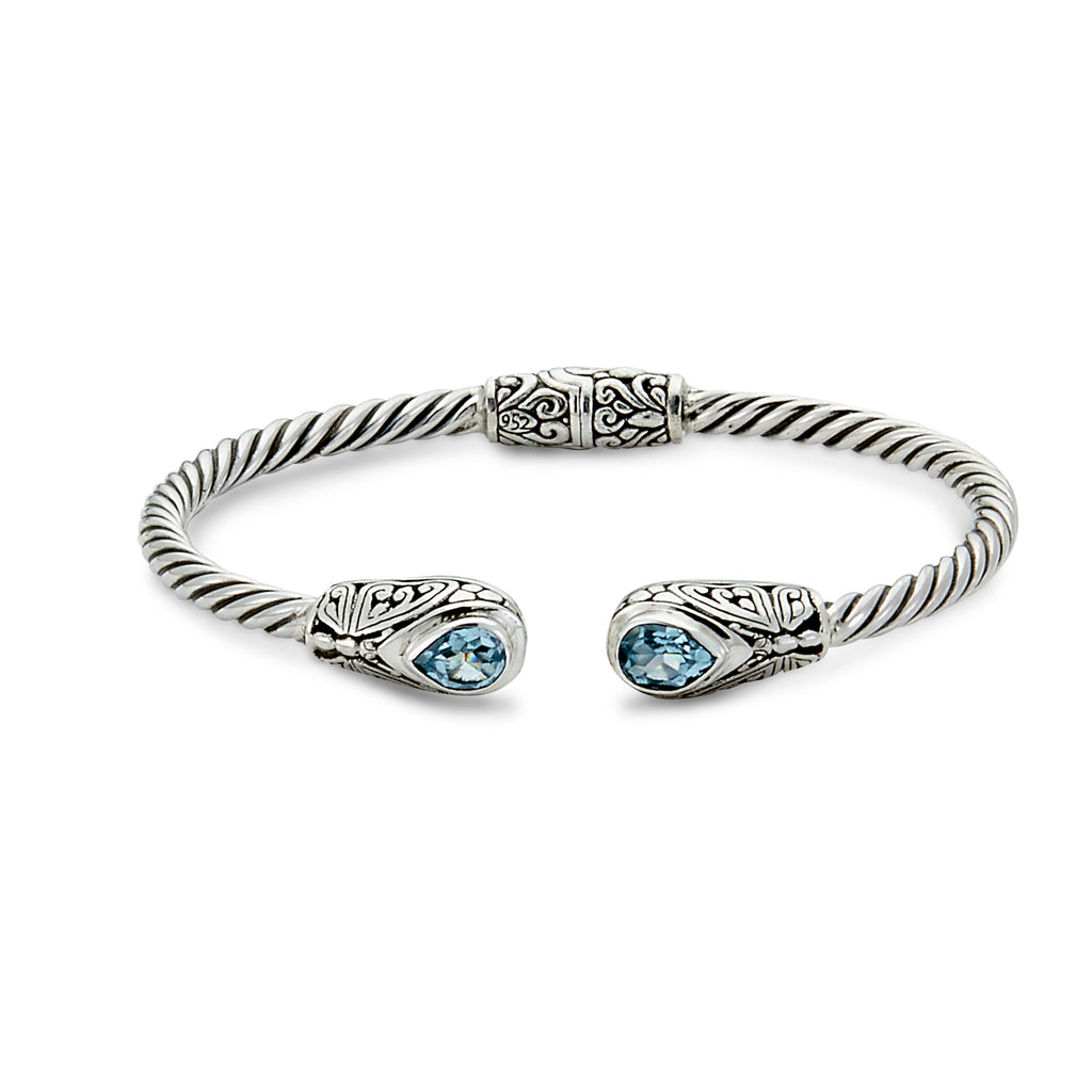 SS 3MM TWISTED CABLE BANLGE WITH PEARSHAPE BLUE TOPAZ