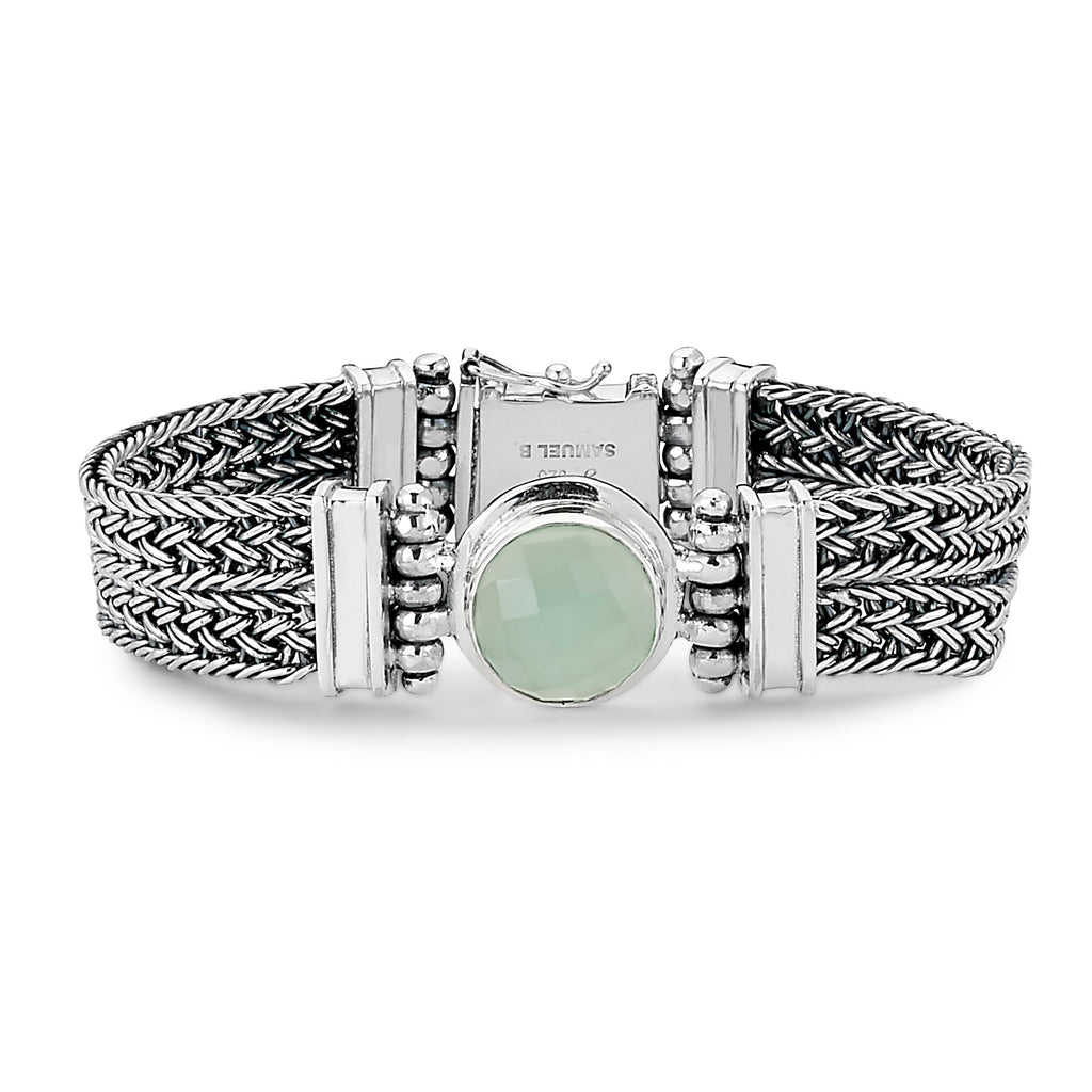 SS WOVEN BRACELET WITH ROUND FACTED AQUA CHALCEDONY 14MM